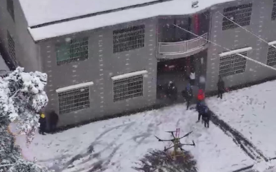 Robot and drone safeguard power supply amid heavy snow in Changsa China